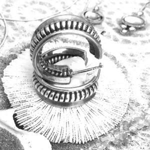 - Silpada Braided Silver Hoop Earrings